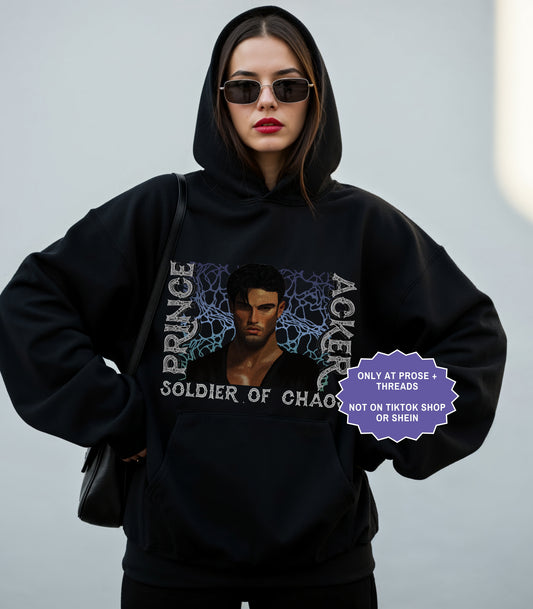 Woman wearing oversized Acker Soldier of Chaos hoodie inspired by Metal Slinger fantasy romance series