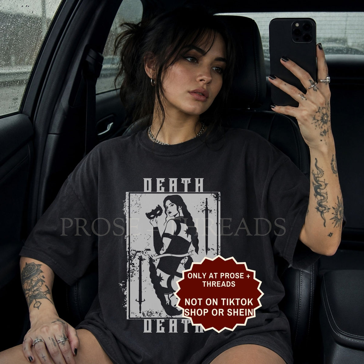 Nesta Archeron Death shirt, featuring a playing card design.
