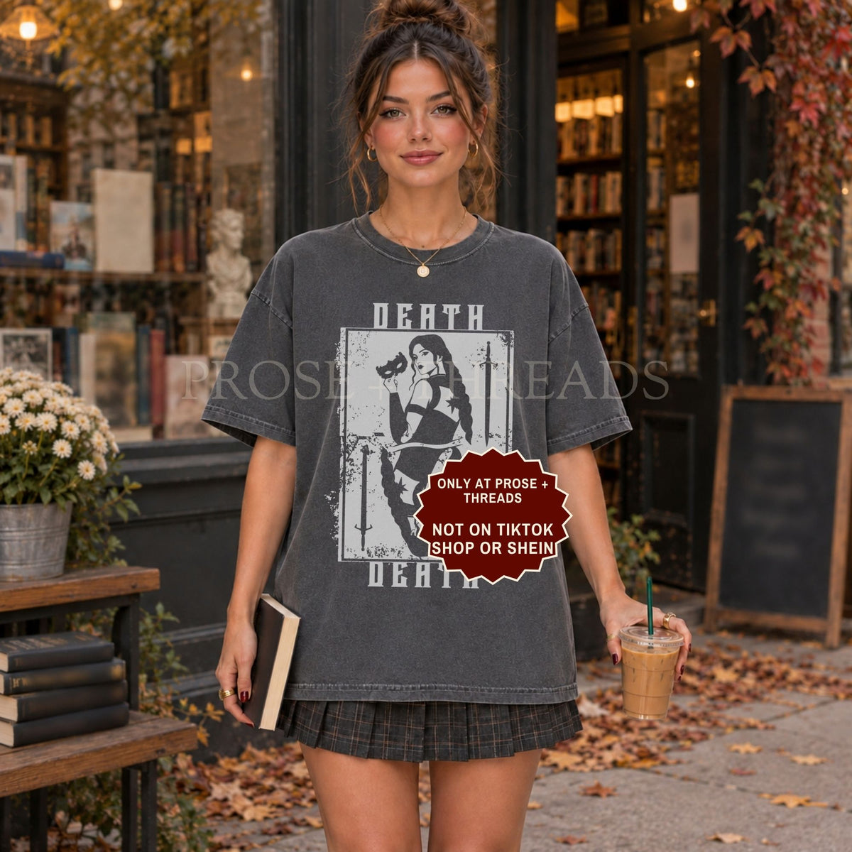 Nesta Archeron Death shirt, featuring a playing card design.