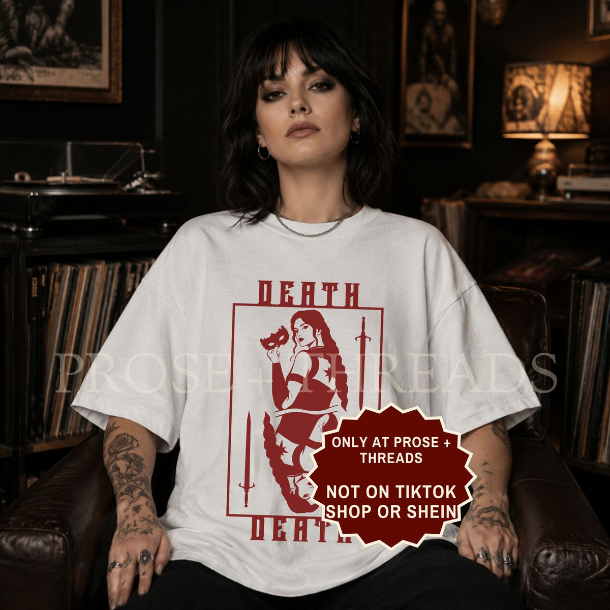 Nesta Archeron Death shirt, featuring a playing card design.