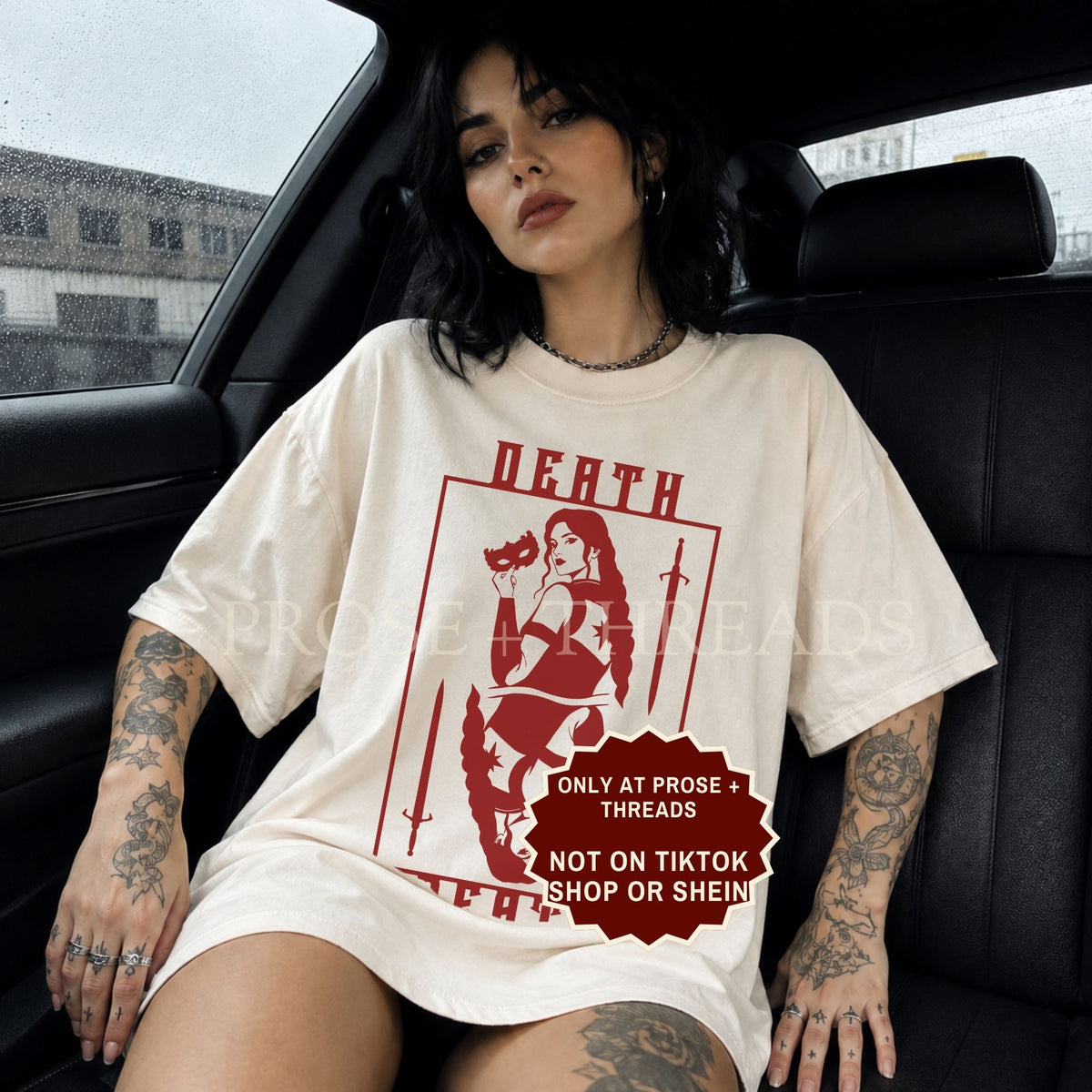 Nesta Archeron Death shirt, featuring a playing card design.