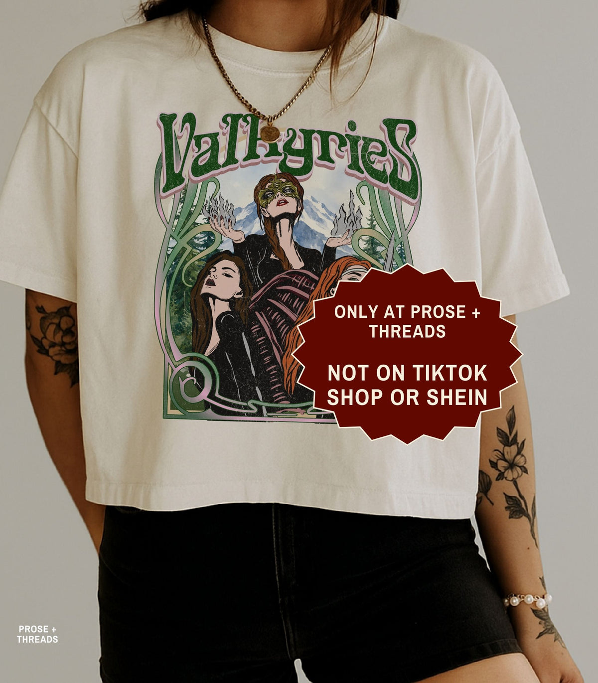 Valkyries boxy cropped T-shirt with vintage ACOTAR inspired graphic of three female warriors and green botanical artwork