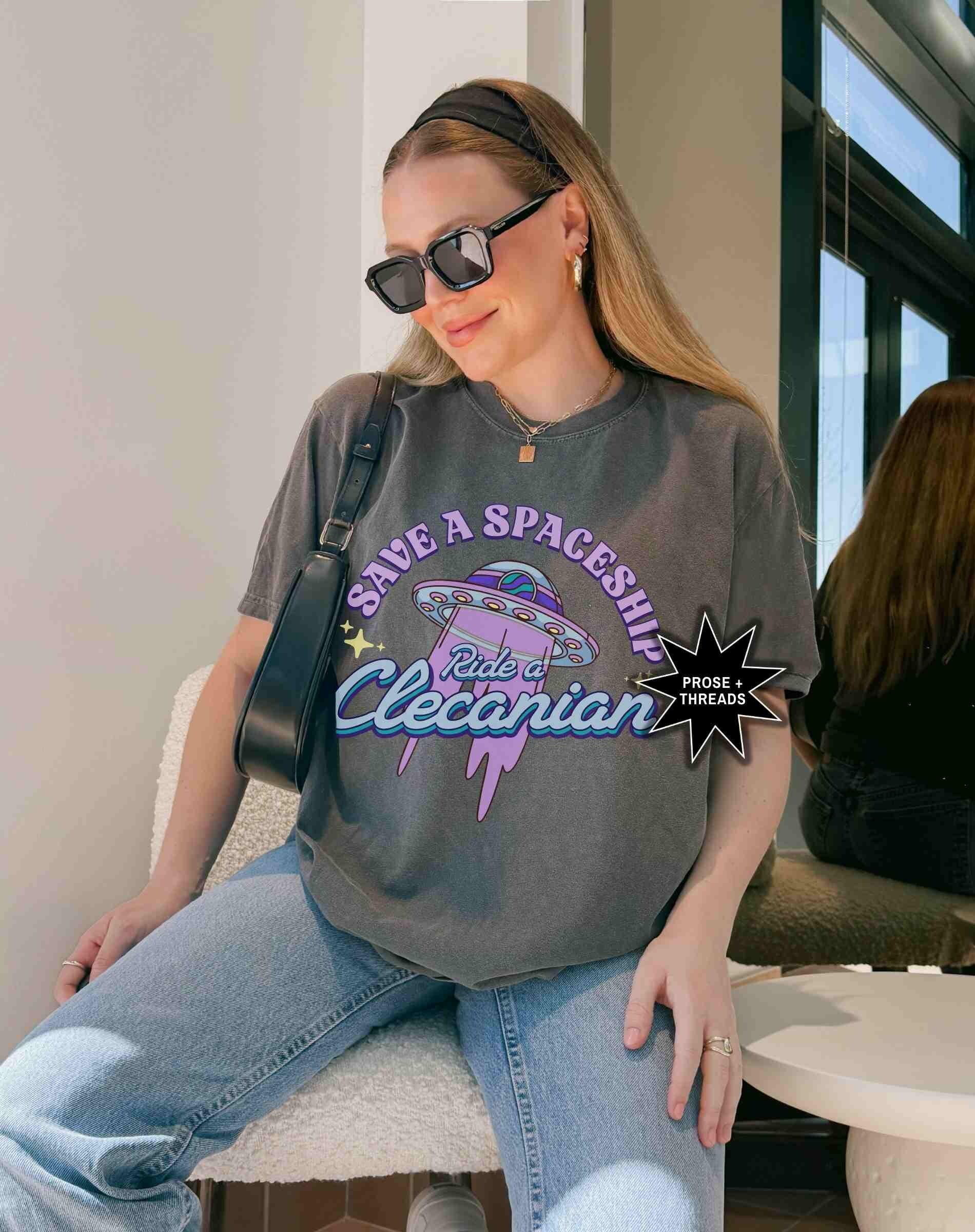 Alien romance shirt with retro spaceship graphic design
