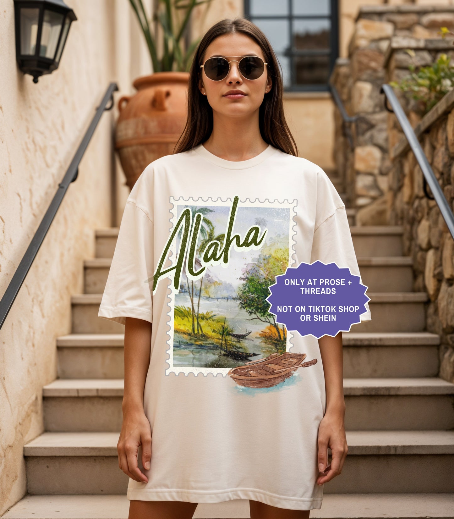 Vintage Alaha postcard fantasy romance shirt inspired by Metal Slinger by Rachel Schneider featuring scenic island artwork on oversized graphic tee