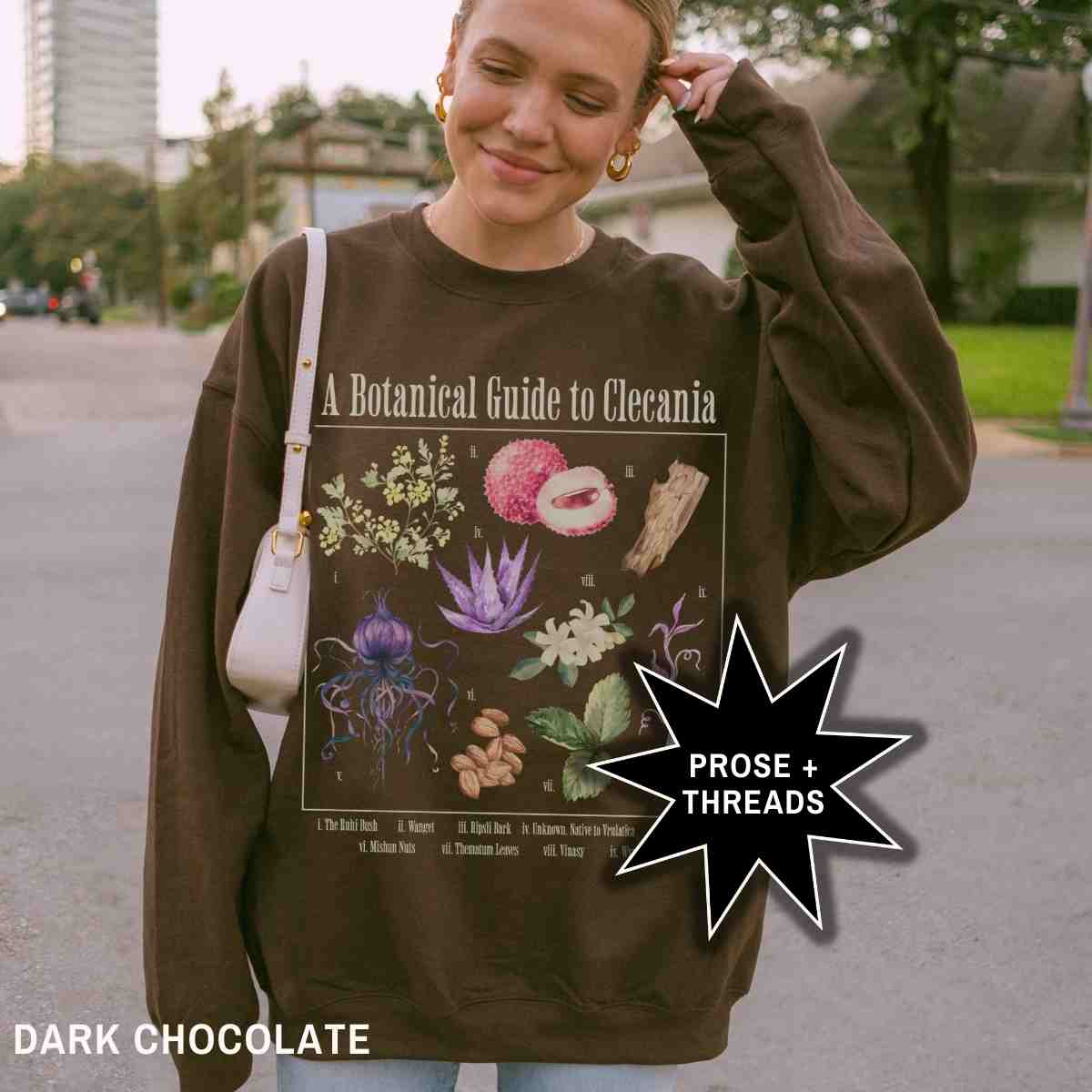 
Cozy fantasy reader sweatshirt with celestial floral graphic