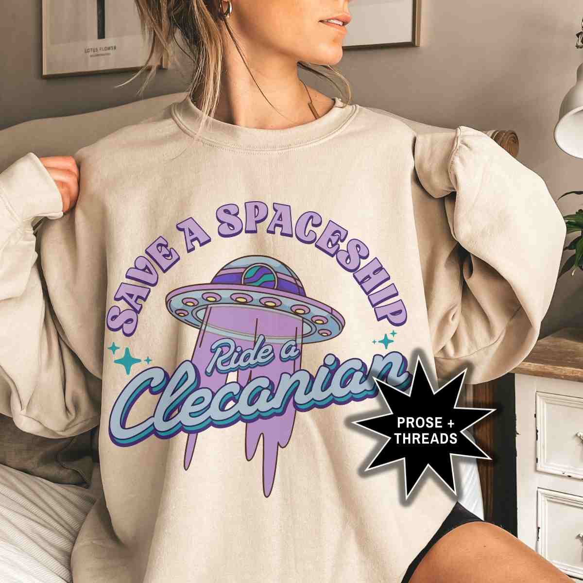 Cozy fantasy reader sweatshirt with retro space aesthetic