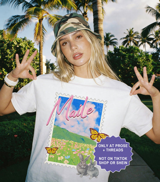 Fantasy romance postcard shirt inspired by Metal Slinger featuring Maile countryside artwork with floral vintage travel aesthetic