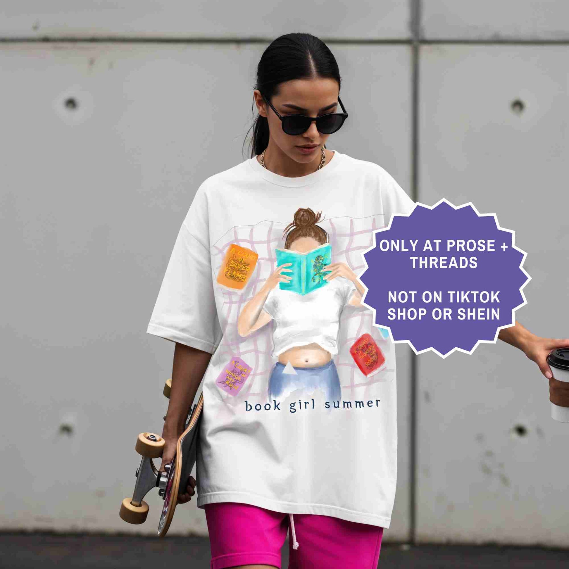 watercolor white shirt featuring a girl reading on a blanket, surrounded by ACOTAR books
