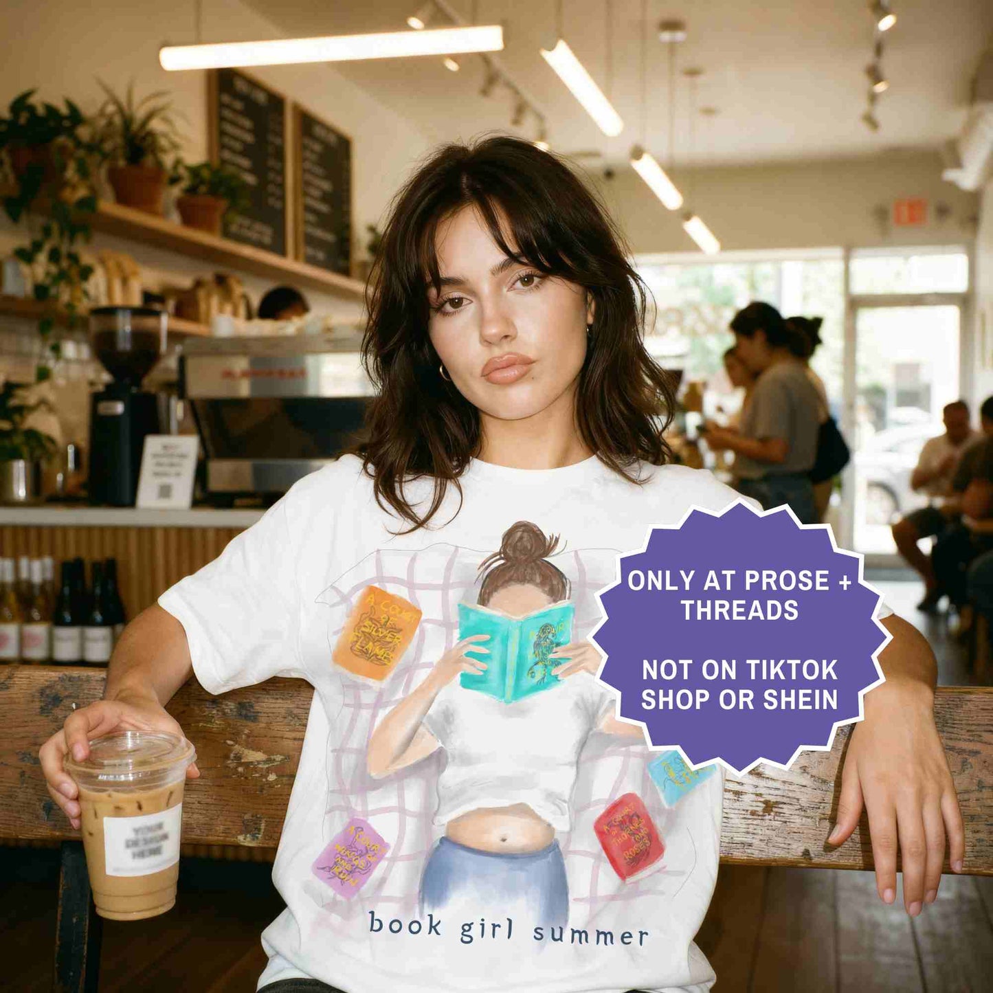 watercolor white shirt featuring a girl reading on a blanket, surrounded by ACOTAR books