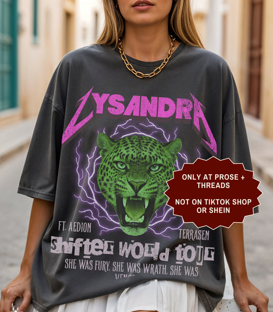 Lysandra Ennar Throne of Glass graphic t-shirt featuring a fierce green feline fantasy design on charcoal gray apparel