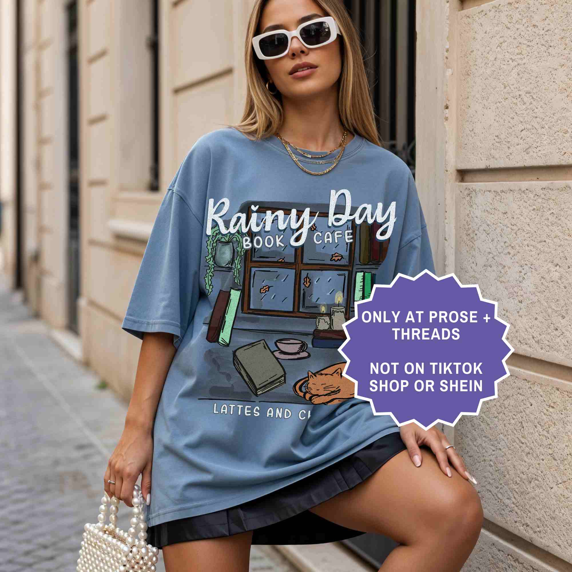Rainy day book café tee for cozy readers. A soft, aesthetic shirt for book lovers who enjoy quiet, rainy reading days.