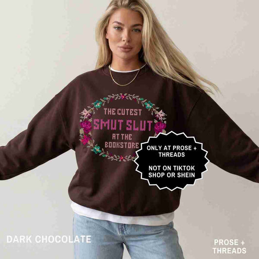 Woman wearing Smut Bookstore Sweatshirt with vintage floral graphic