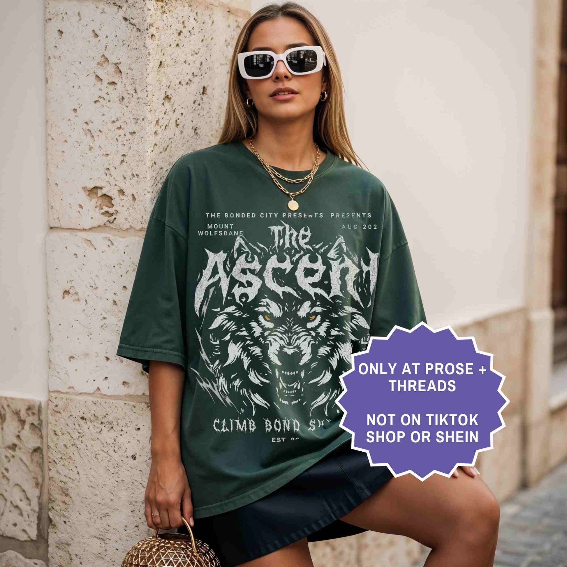 Woman wearing The Ascent Dire Bound dark romantasy shirt with dire wolf graphic