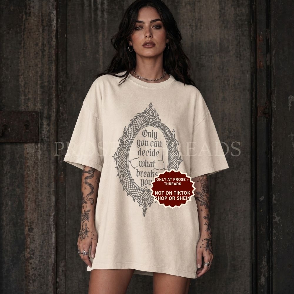 ACOTAR Ouroboros shirt in ivory featuring gothic mirror artwork and Only You Can Decide What Breaks You quote