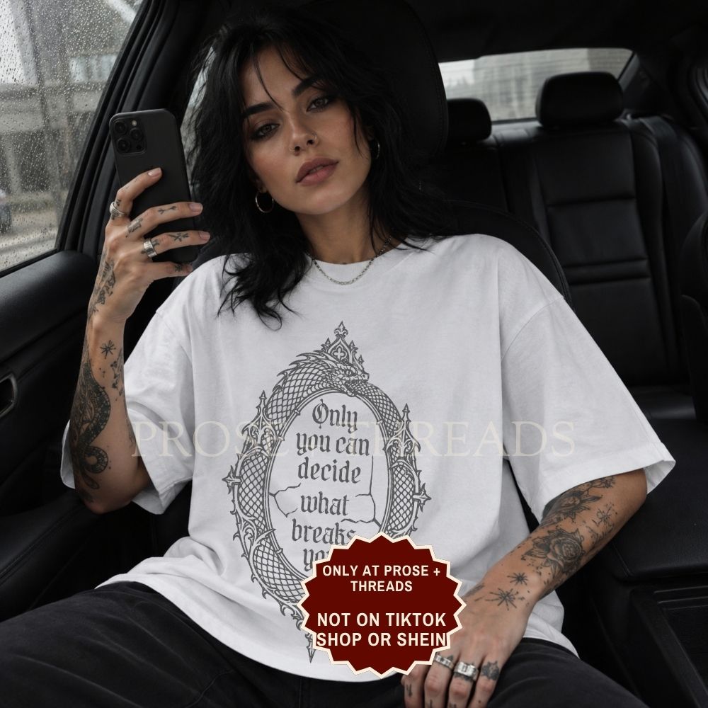ACOTAR Ouroboros shirt in ivory featuring gothic mirror artwork and Only You Can Decide What Breaks You quote